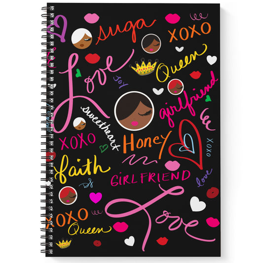 Notebook with colorful text and graphics on a black background