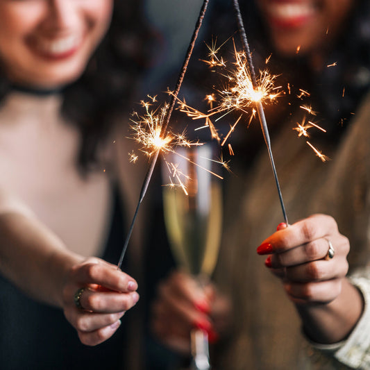 women with sparklers