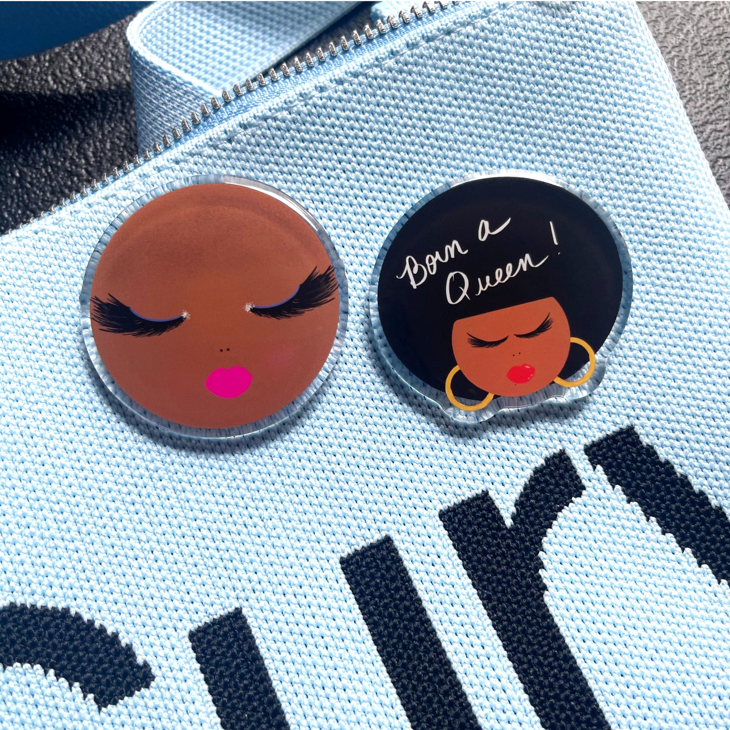 Faith, beautiful bald woman and Angela woman with afro acrylic pin featuring on a blu tote bag
